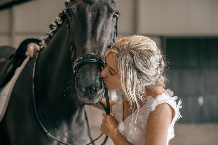 Coach Caroline en haar paard Jasmine